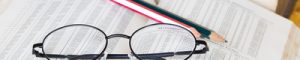 book Glasses with pencil on formula math table in math book